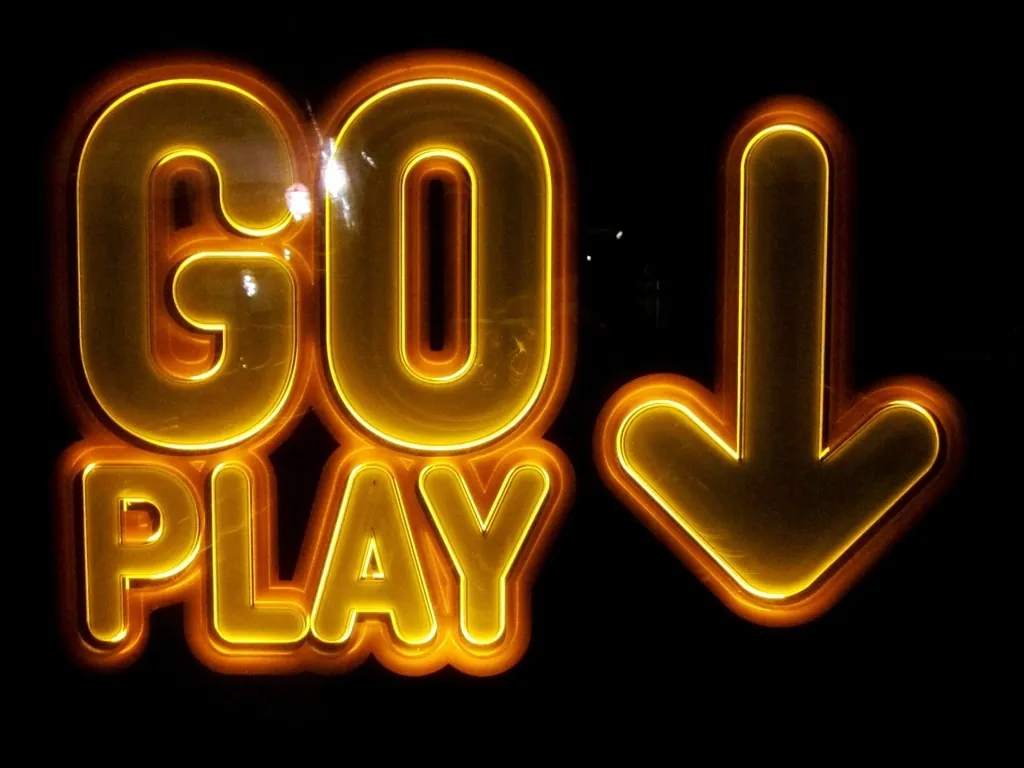 A lit casino sign at night