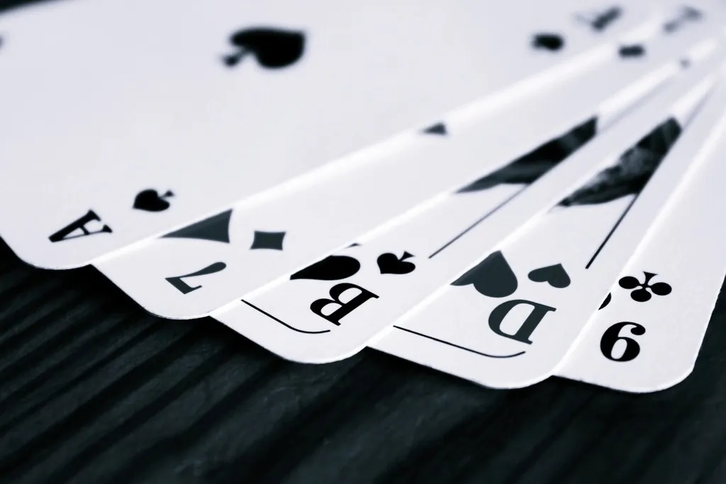 Chips and hole cards on a poker table