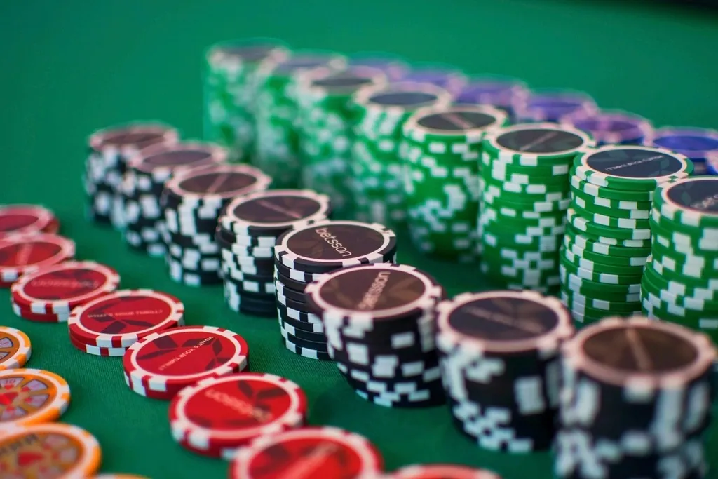 Chips and hole cards on a poker table