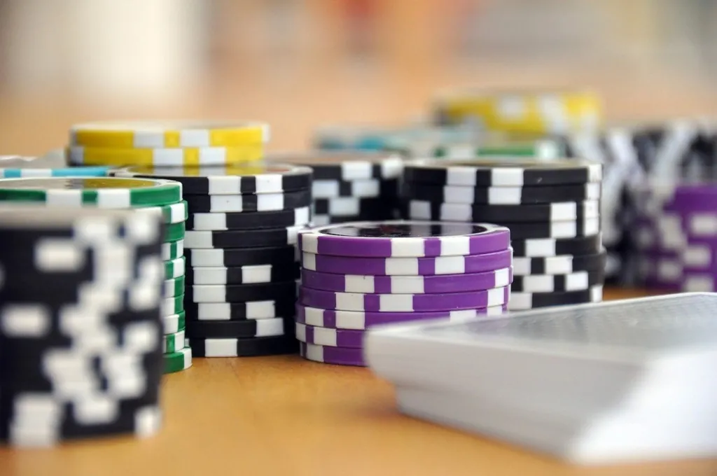 Chips and hole cards on a poker table