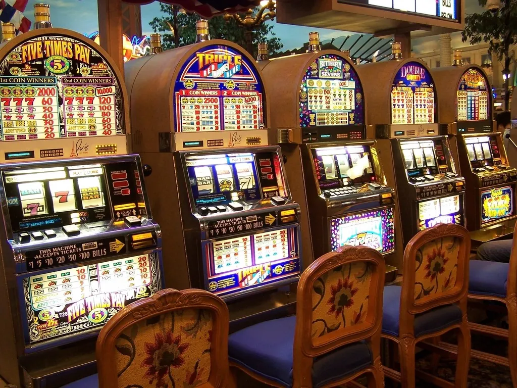 Slot machine cabinets lined up in a casino